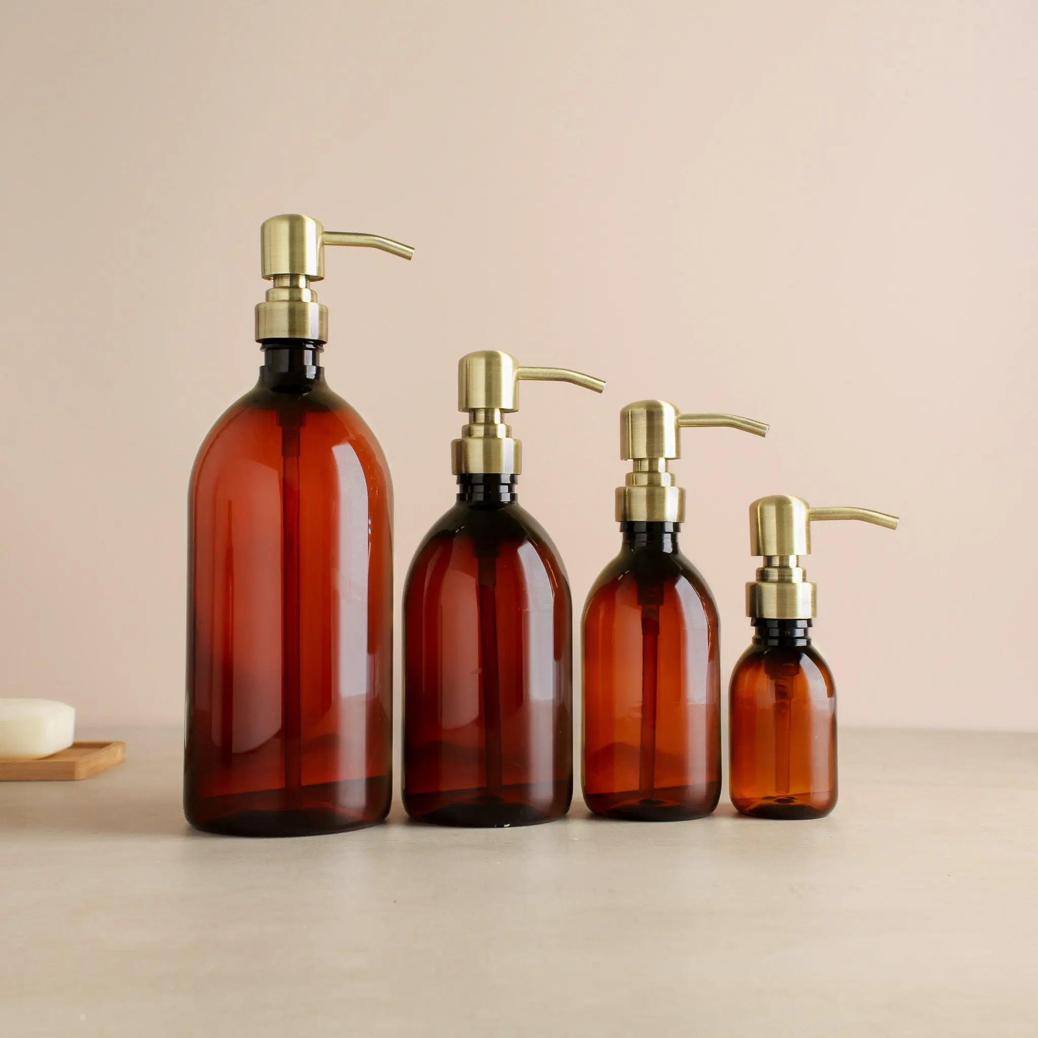 Amber Plastic Dispenser Bottle With Metal Gold Pump - Image 2
