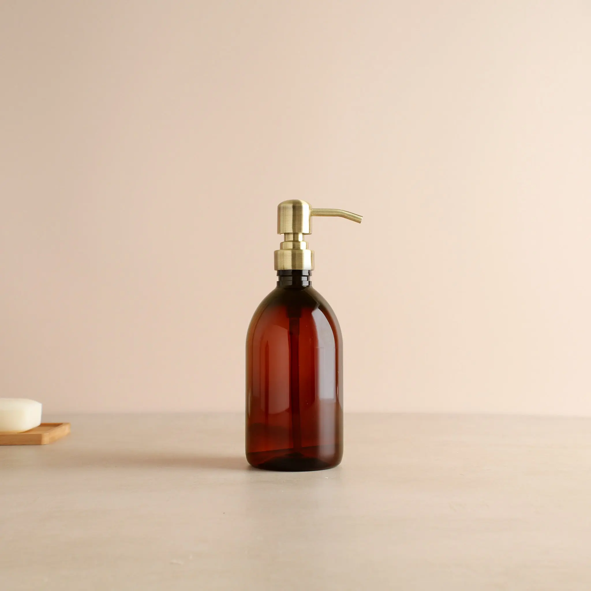 Amber Plastic Dispenser Bottle With Metal Gold Pump - Image 4