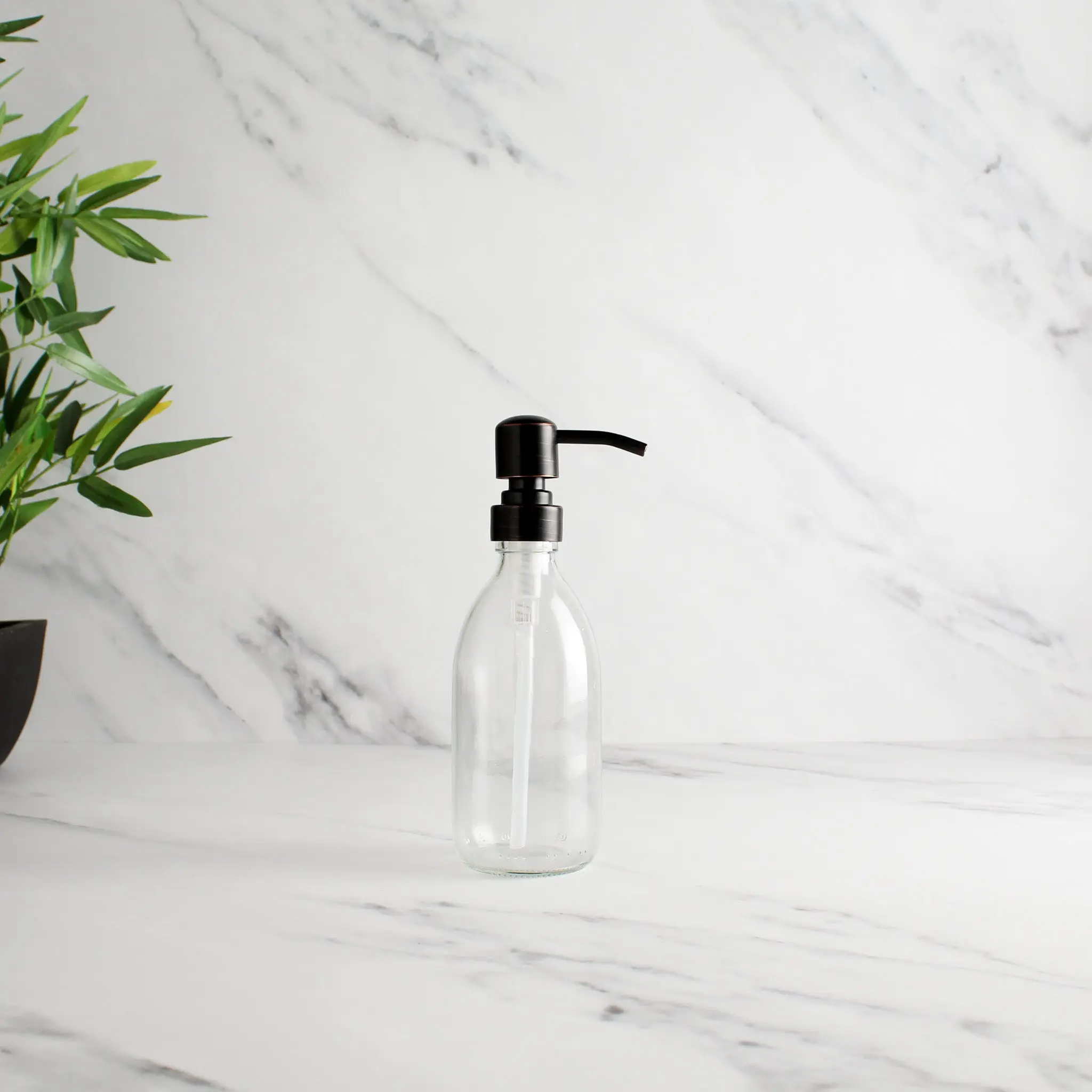 Clear Glass Dispenser Bottle With Black/Copper Pump - Image 5