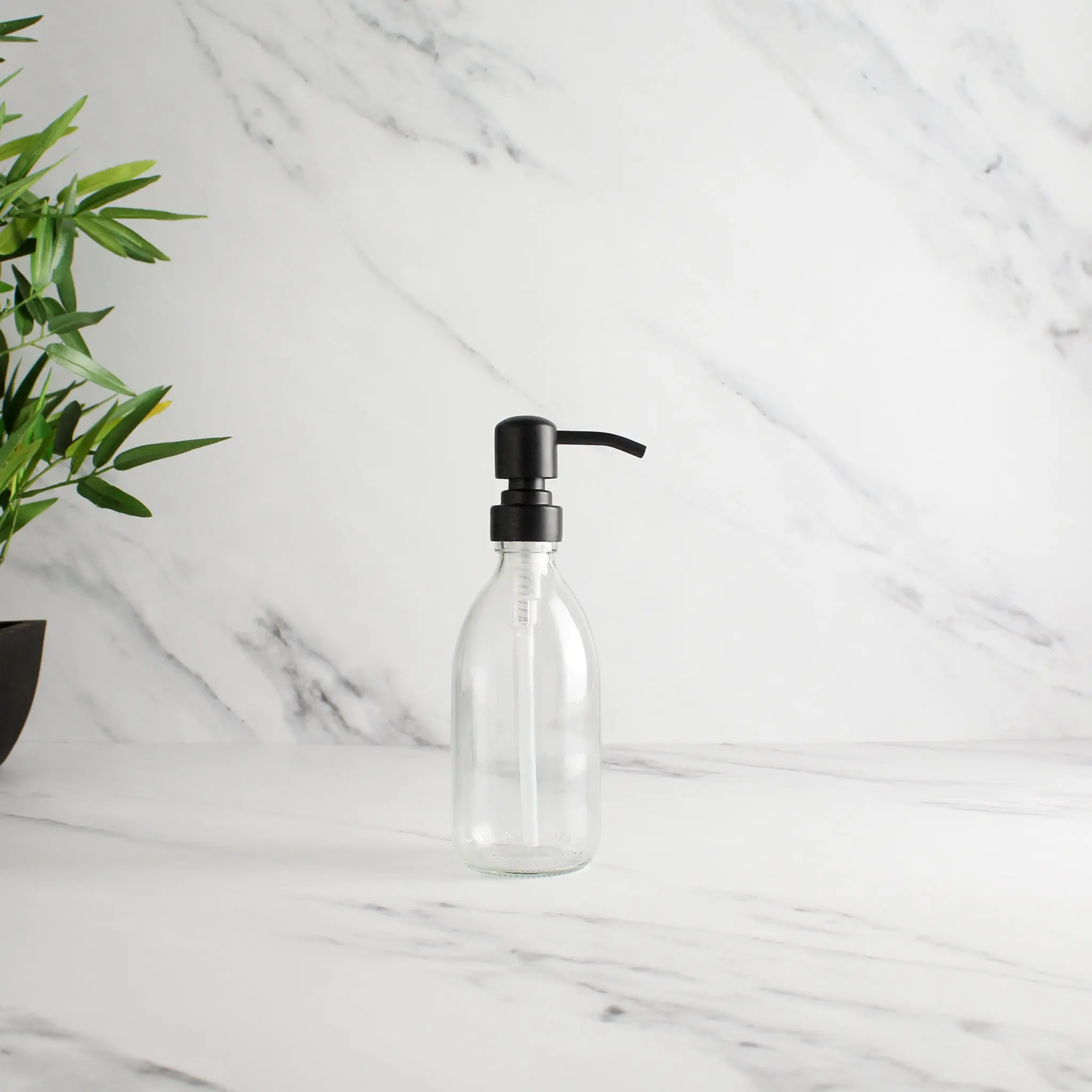 Clear Glass Dispenser Bottle With Matte Black Pump - Image 5