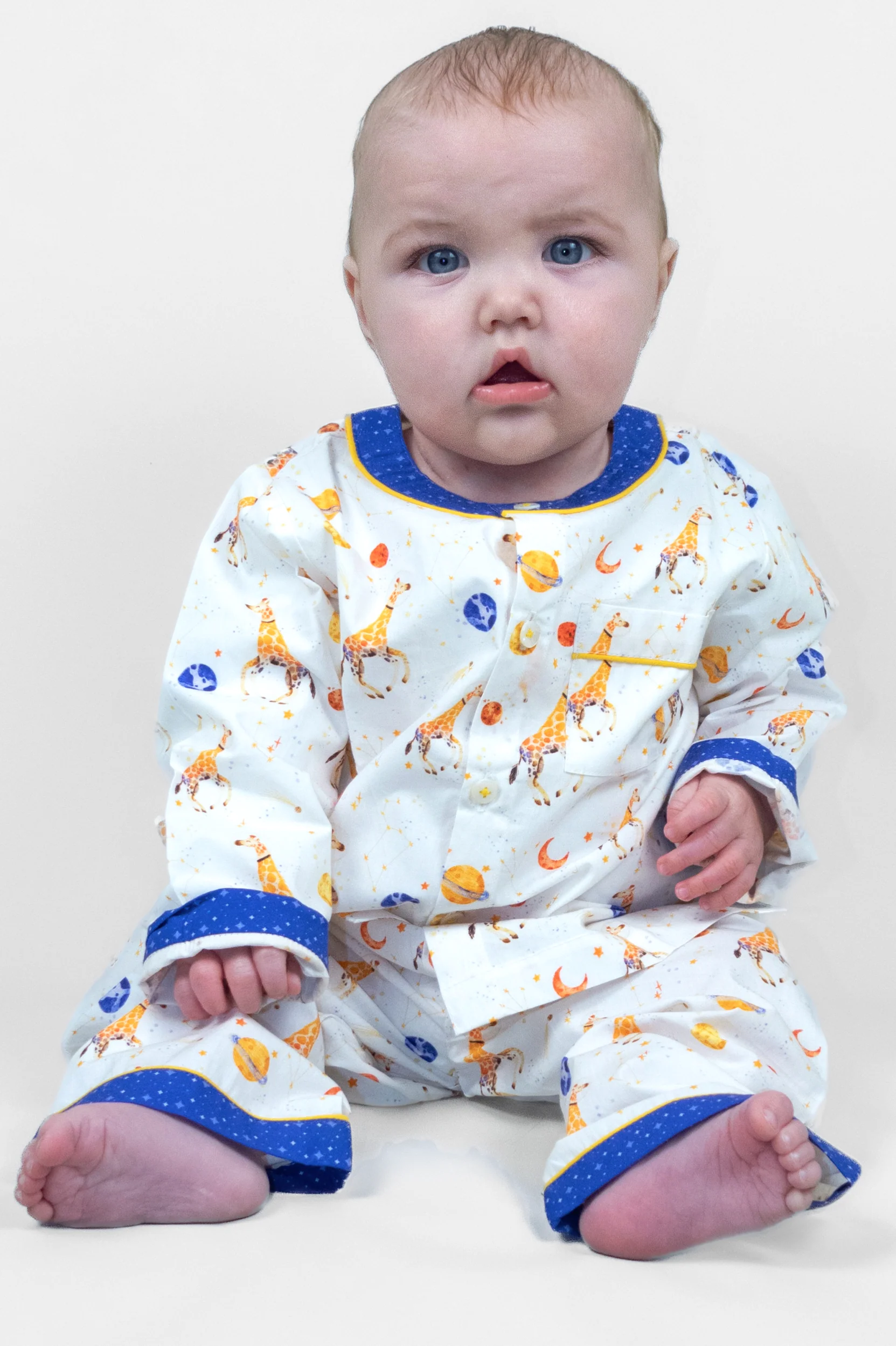 giraffe space odyssey organic cotton baby pyjama set