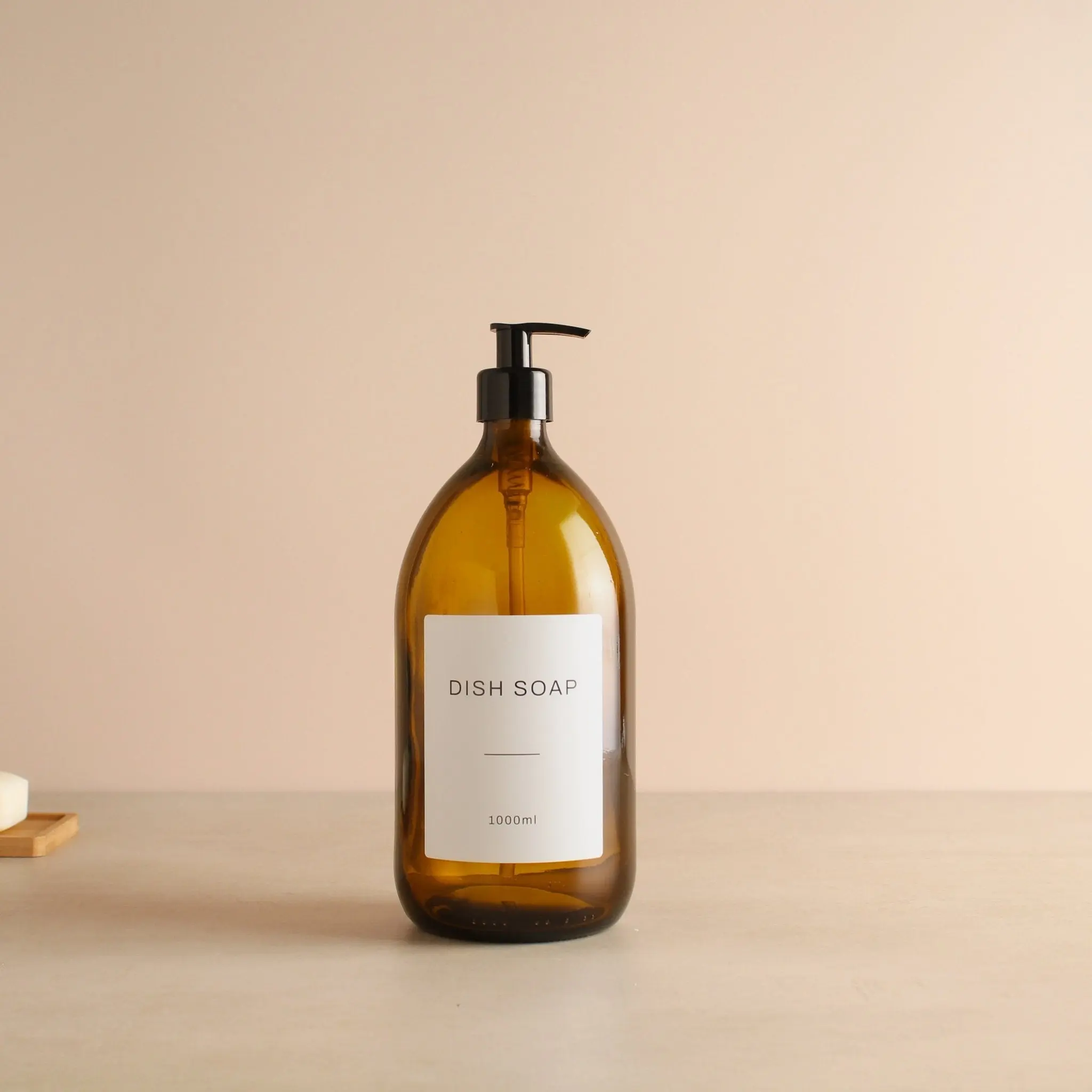 Labelled Amber Glass Dispenser Bottle With Black Pump - Image 3