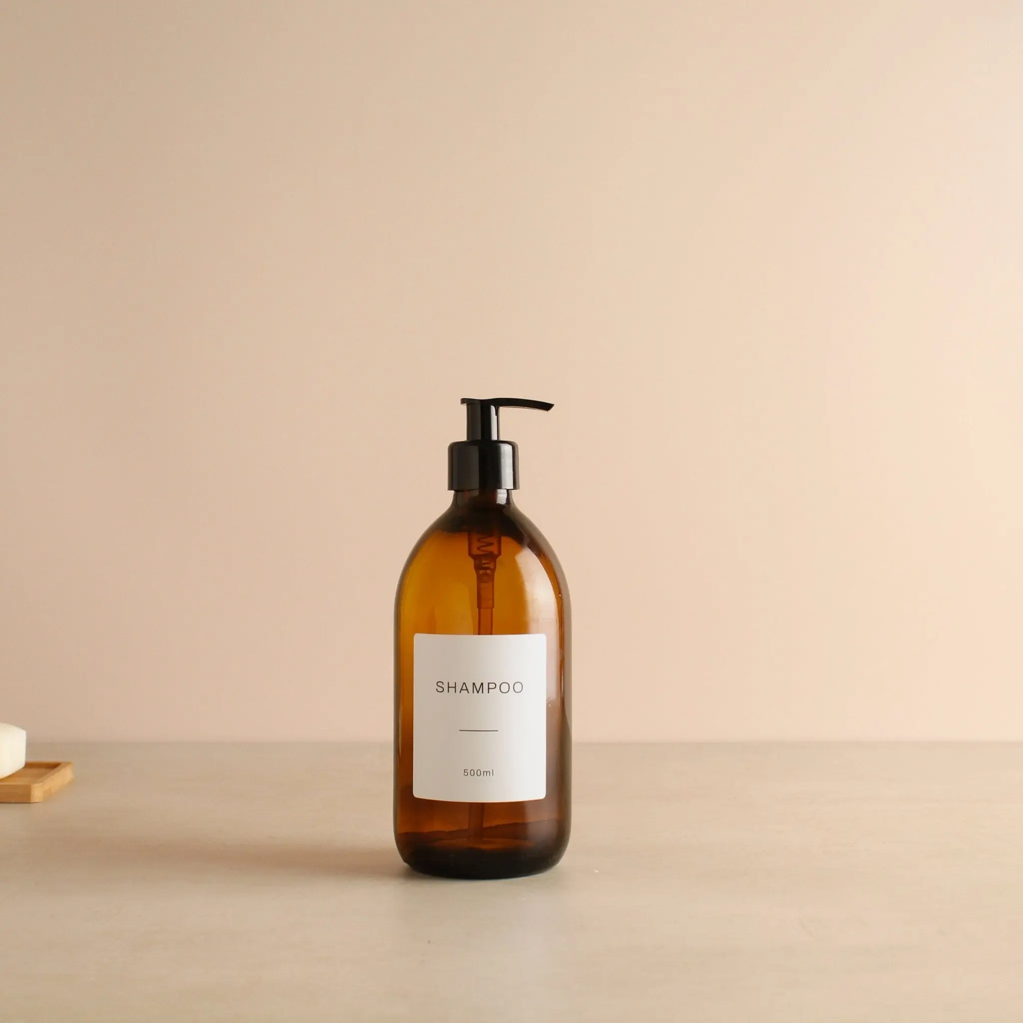 Labelled Amber Glass Dispenser Bottle With Black Pump - Image 4