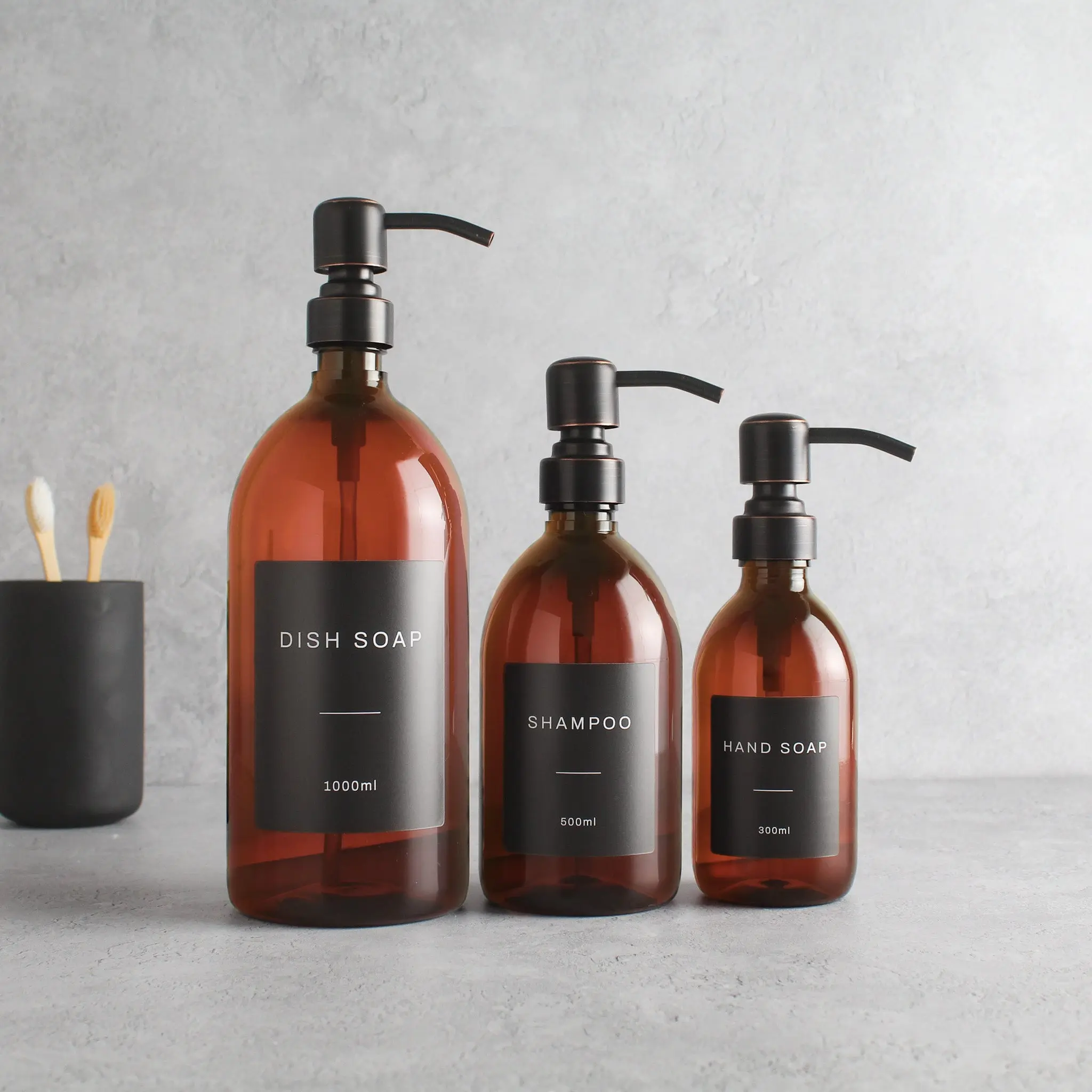 Labelled Amber Plastic Dispenser Bottle With Black/Copper Pump - Image 2