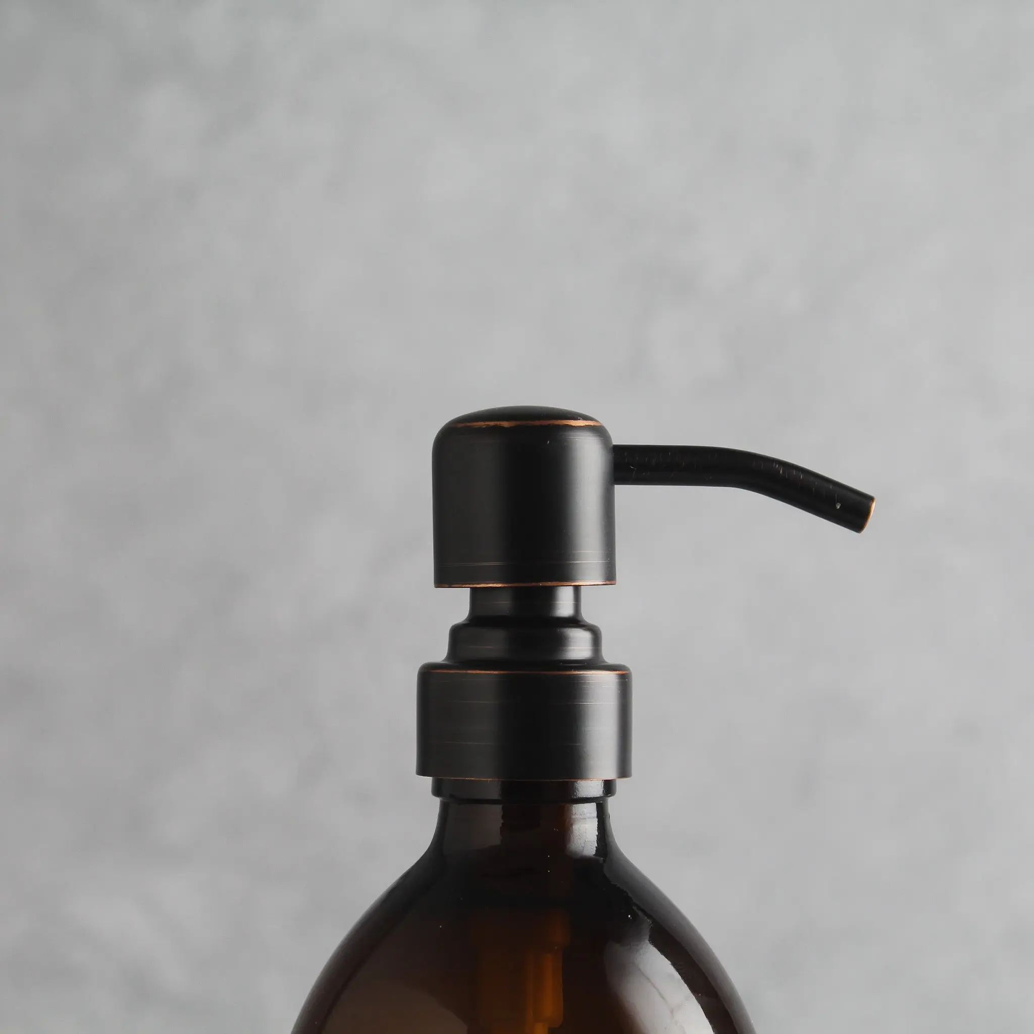 Labelled Amber Plastic Dispenser Bottle With Black/Copper Pump - Image 6