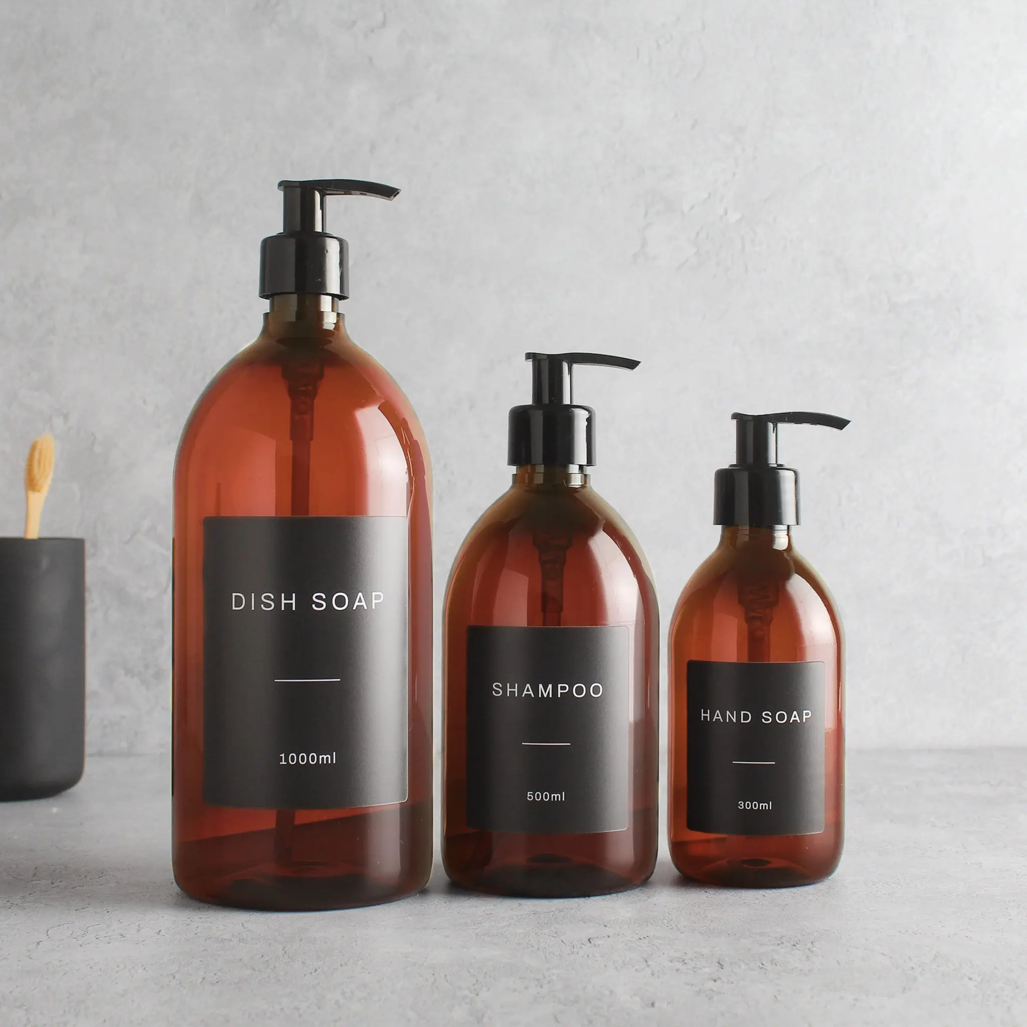 Labelled Amber Plastic Dispenser Bottle With Black Pump