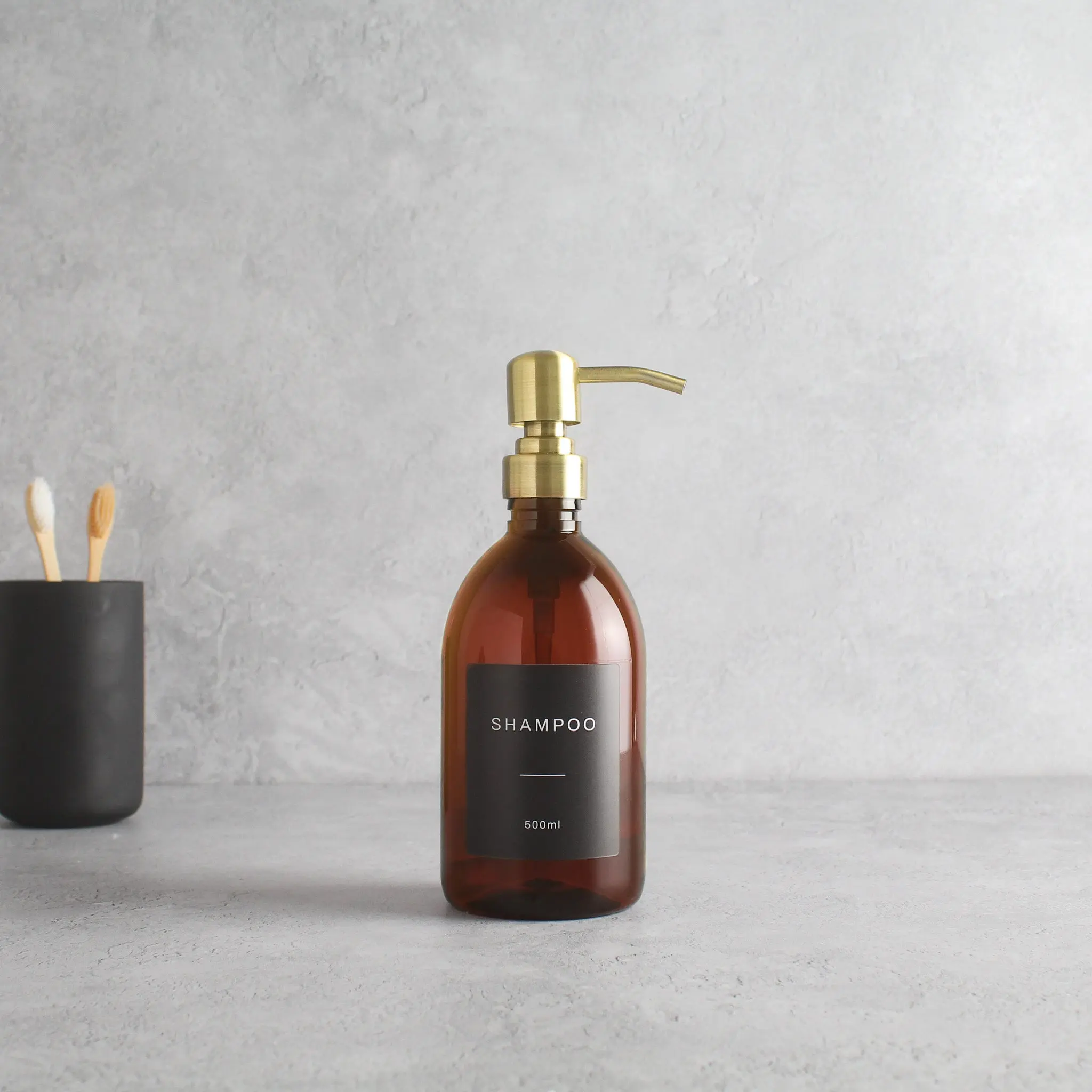 Labelled Amber Plastic Dispenser Bottle With Gold Pump - Image 4