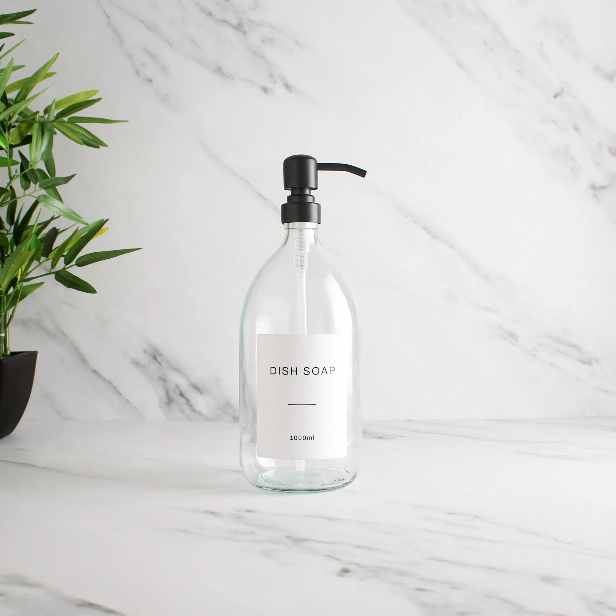 Labelled Clear Glass Dispenser Bottle With Matte Black Pump - Image 3