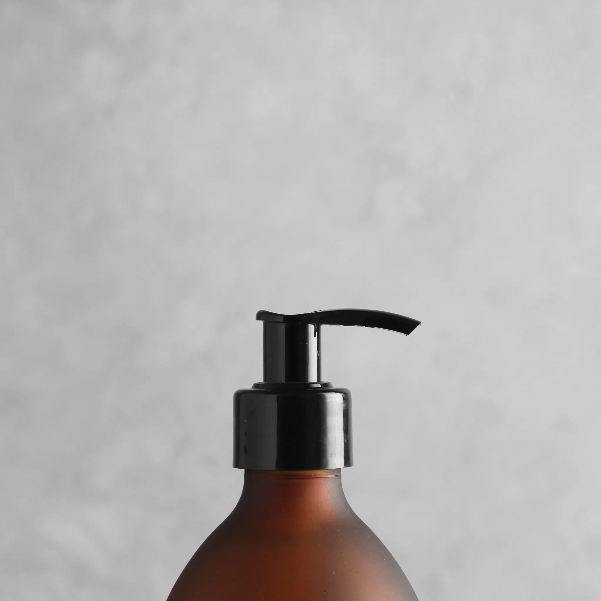 Labelled Frosted Amber Glass Dispenser Bottle With Black Pump - Image 6