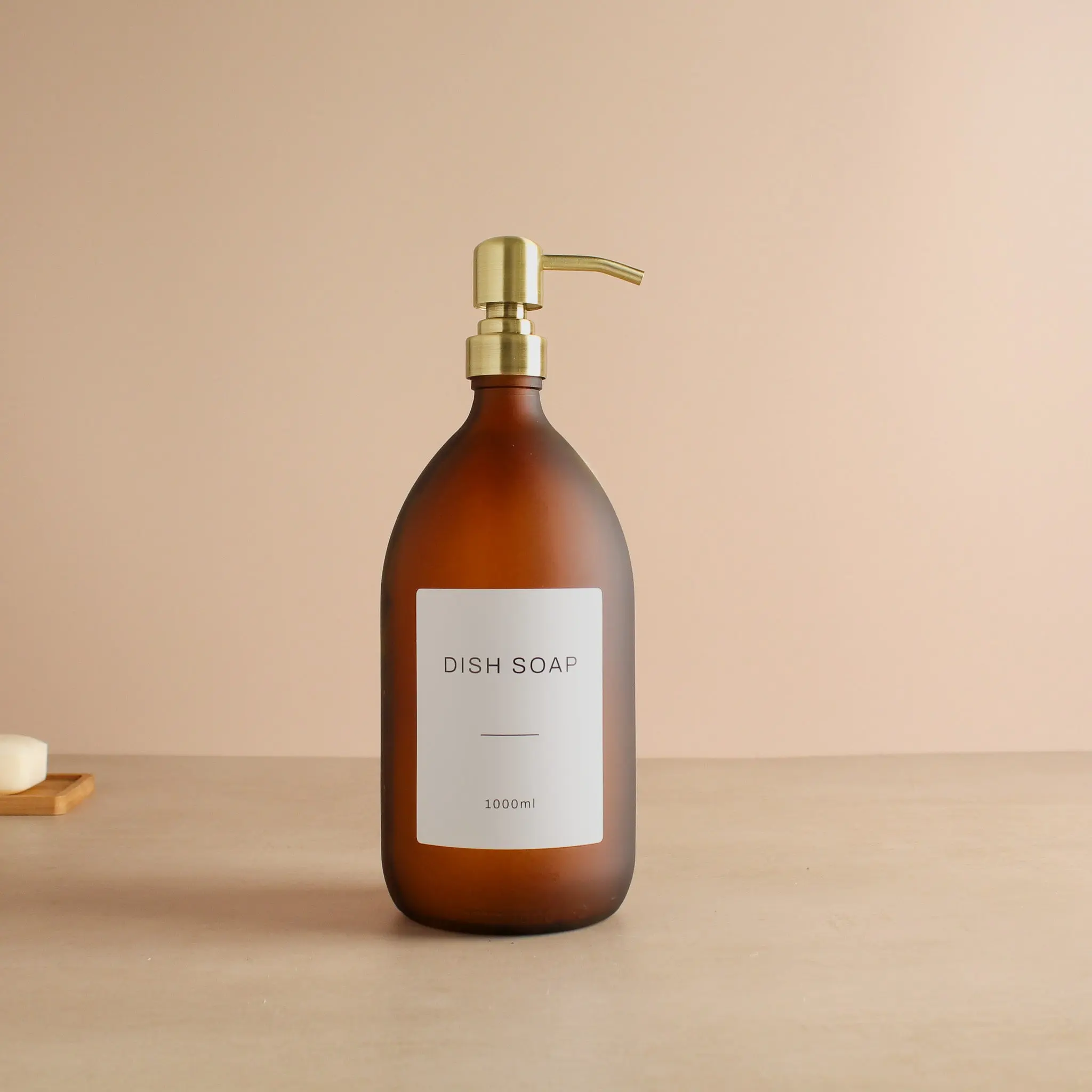 Labelled Frosted Amber Glass Dispenser Bottle With Gold Pump - Image 3