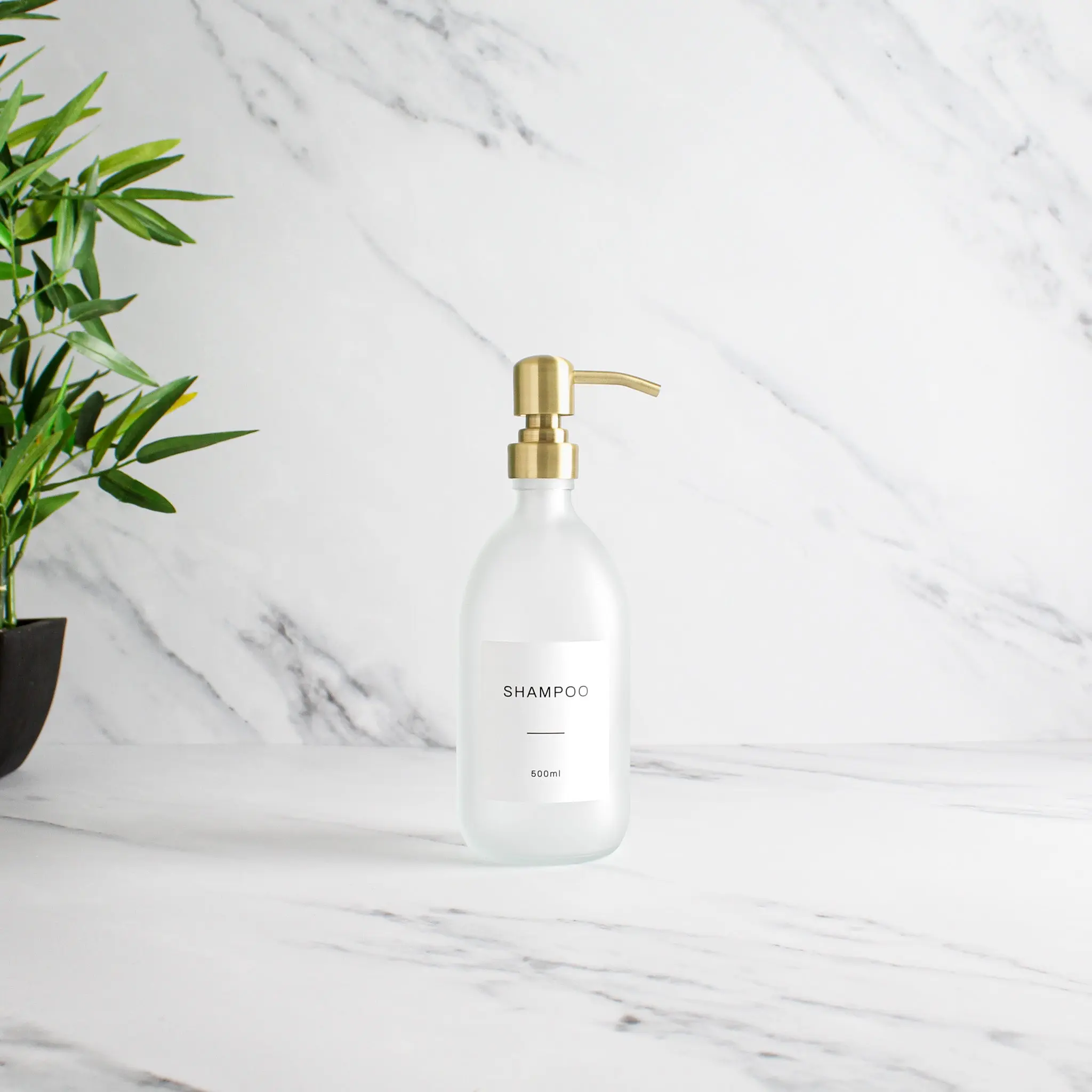Labelled Frosted White Glass Dispenser Bottle With Gold Pump - Image 4