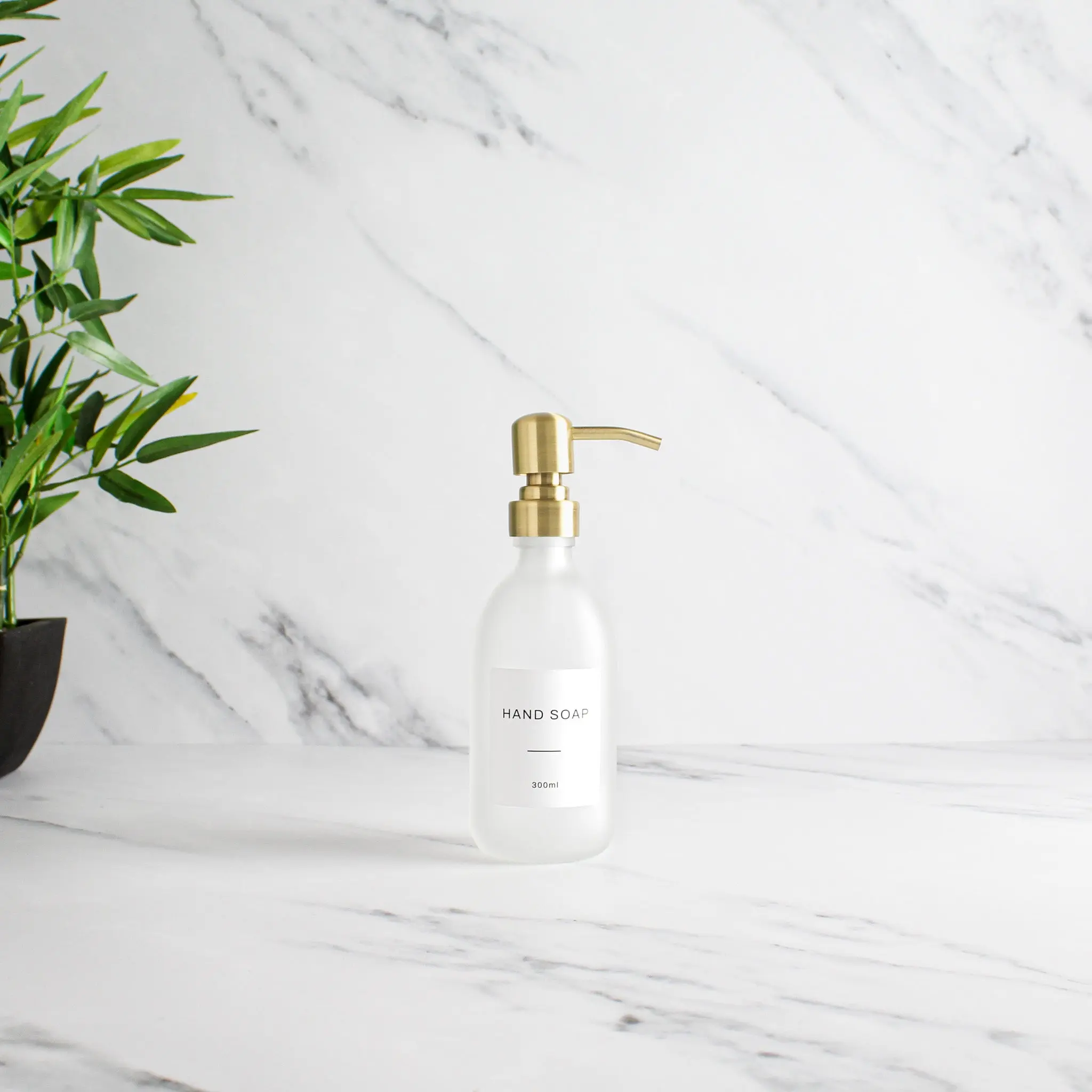 Labelled Frosted White Glass Dispenser Bottle With Gold Pump - Image 5