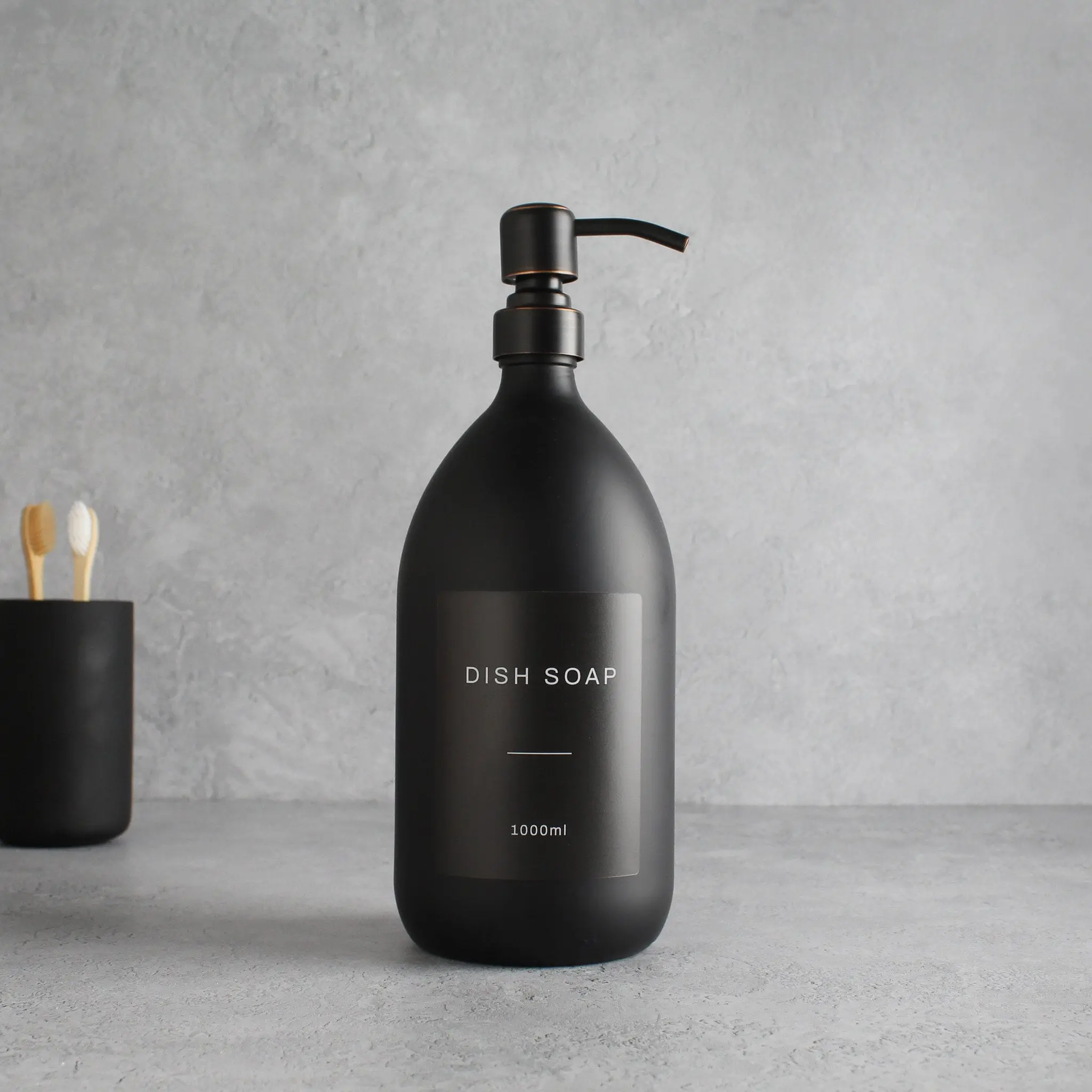 Labelled Matte Black Glass Dispenser Bottle With Black/Copper Pump - Image 3