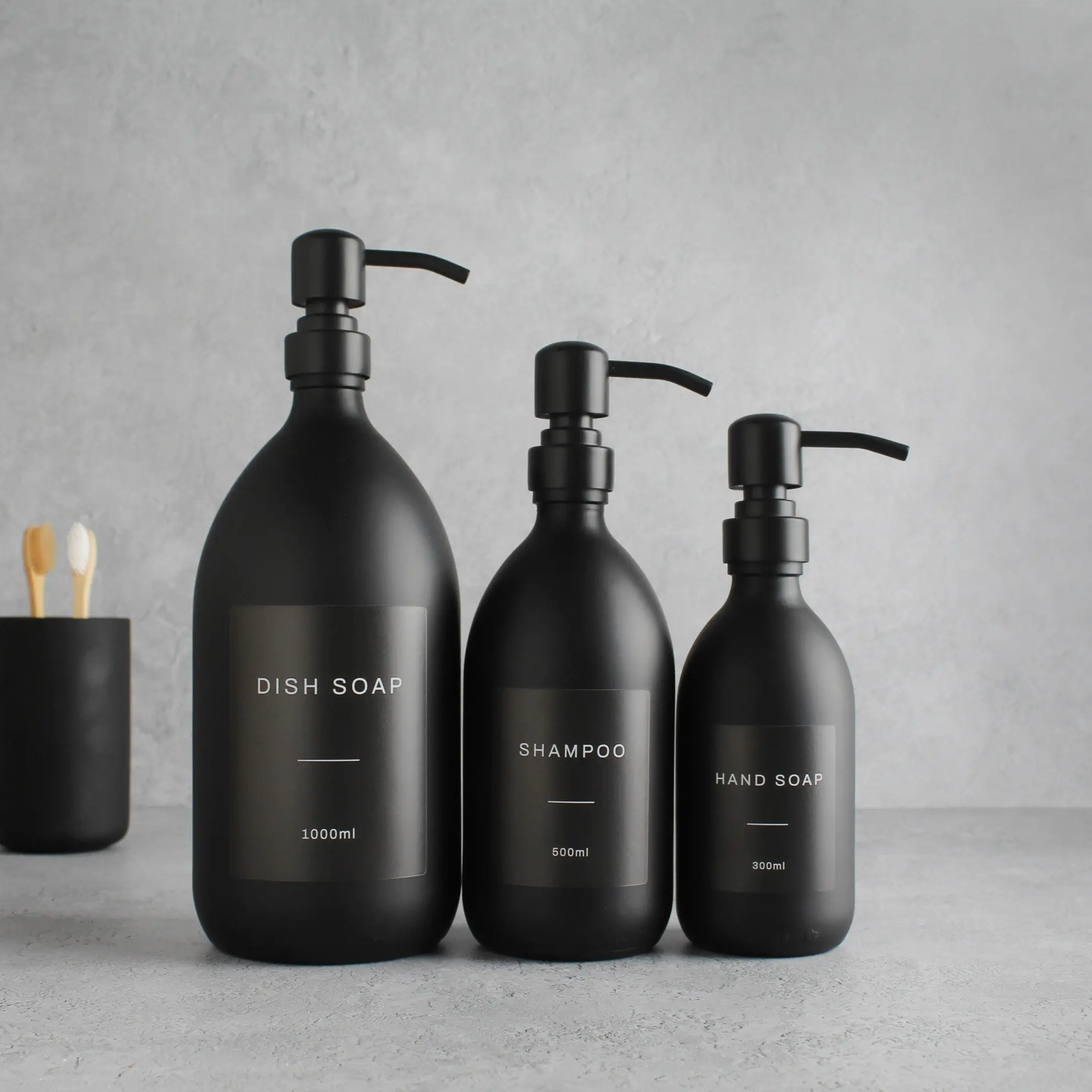 Labelled Matte Black Glass Dispenser Bottle With Matte Black Pump
