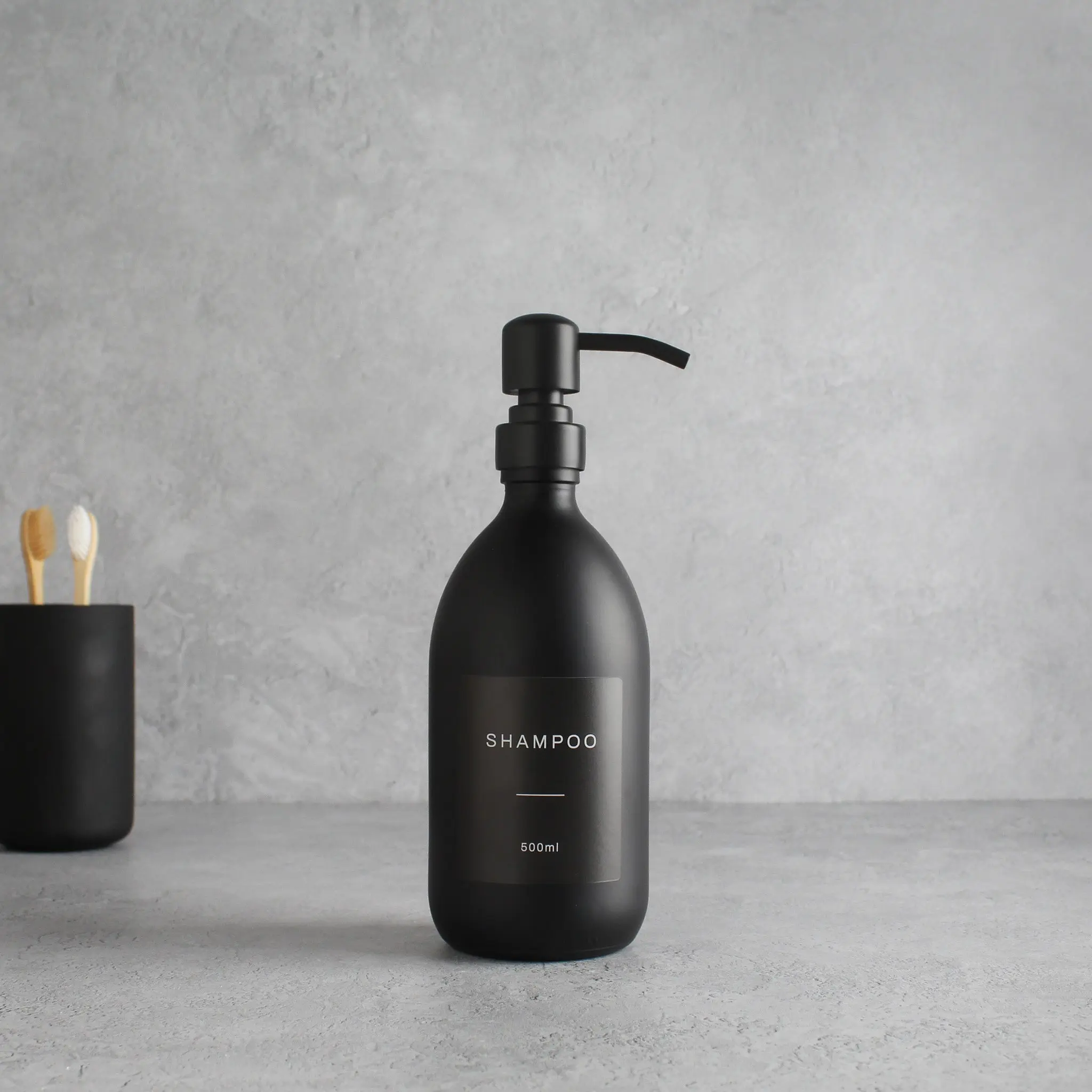 Labelled Matte Black Glass Dispenser Bottle With Matte Black Pump - Image 3