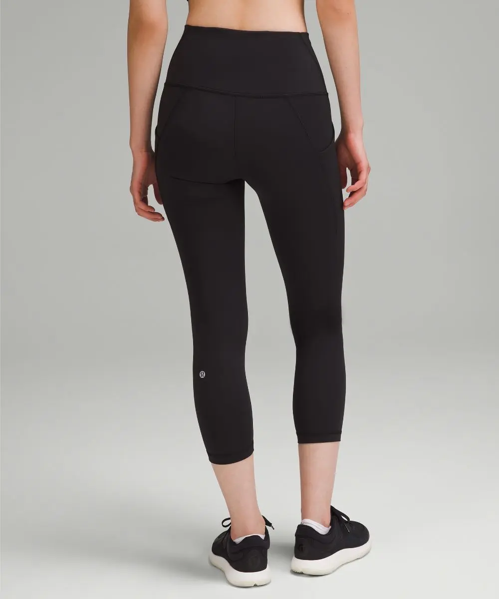 Women's Wunder Train High-Rise Crop Leggings with Pockets - Image 3