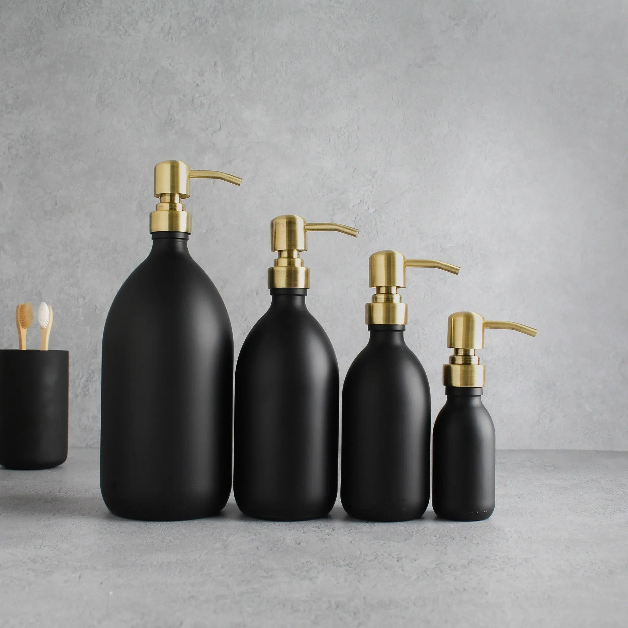Matte Black Glass Dispenser Bottle With Gold Pump - Image 2