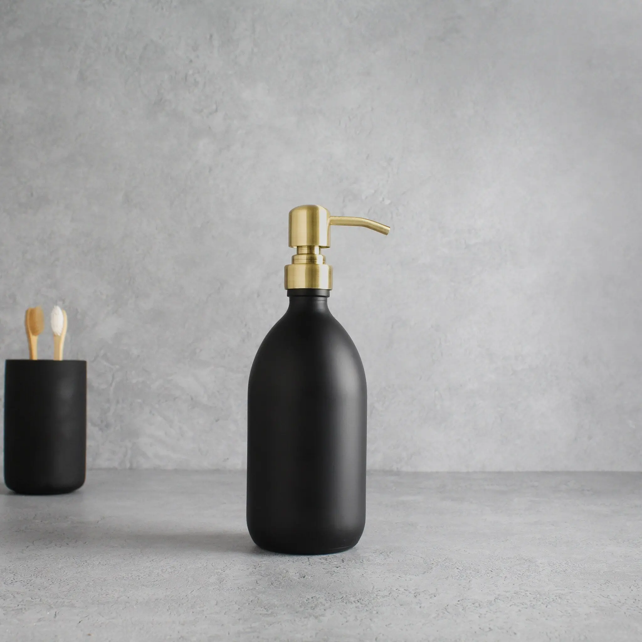 Matte Black Glass Dispenser Bottle With Gold Pump - Image 4