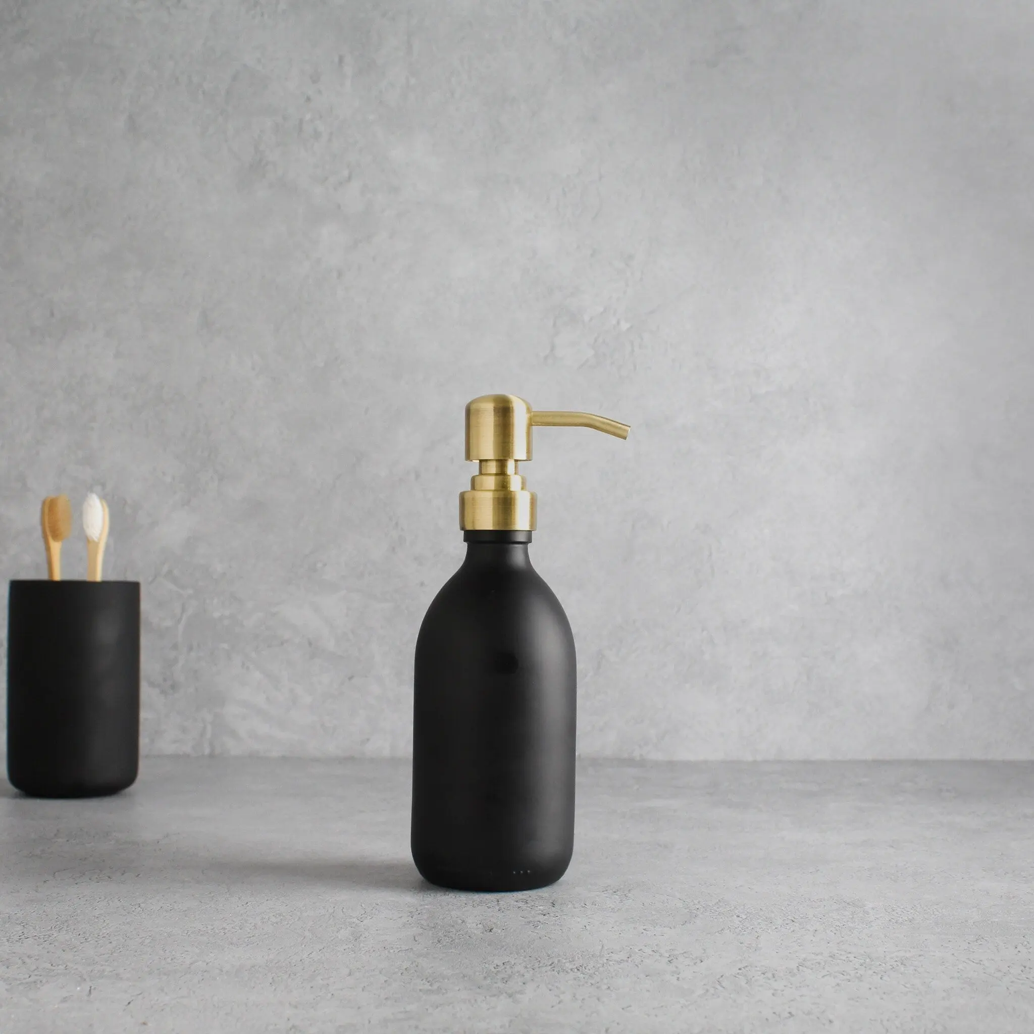 Matte Black Glass Dispenser Bottle With Gold Pump - Image 5